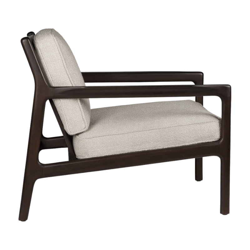 The Jack Lounge Chair from Ethnicraft with an ivory cushion from the side.