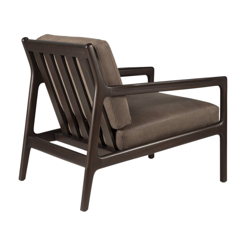 The Jack Lounge Chair from Ethnicraft with a terra nubuck leather cushion from the back.