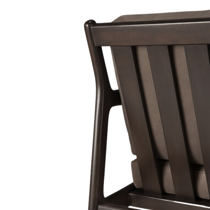 The Jack Lounge Chair from Ethnicraft with a terra nubuck leather cushion in detail.