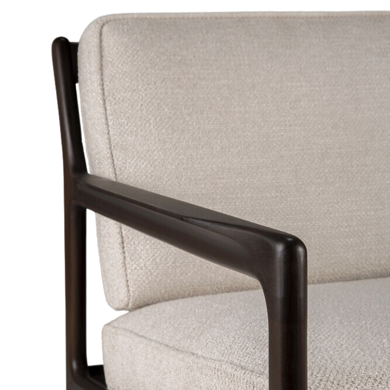 The Jack Sofa by Ethnicraft with Ivory Cushion arm rest.