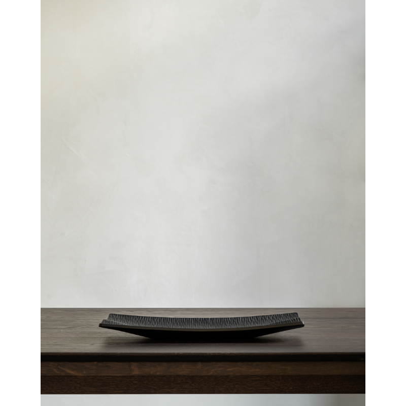 The Japan Board from Ethnicraft in a family area.