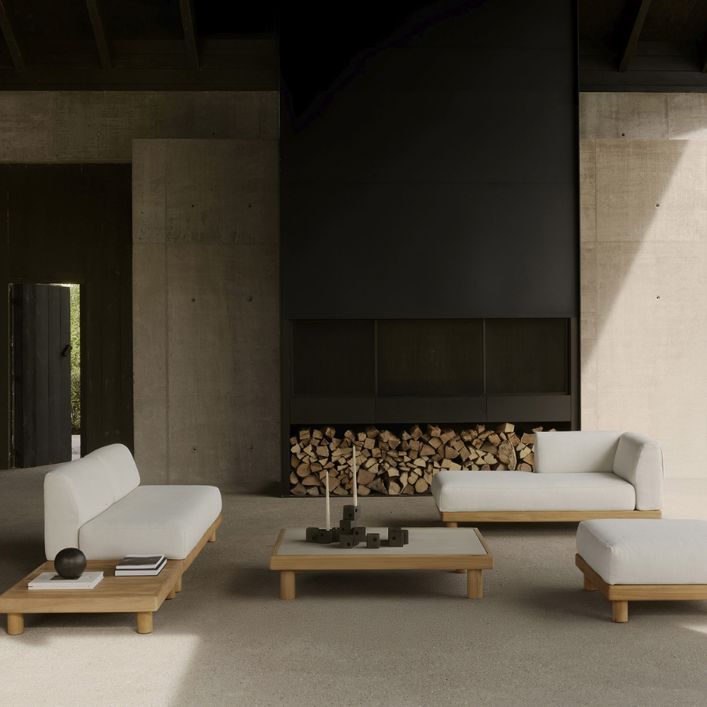 The Monocle Outdoor Modular Sofa from Ethnicraft in an outdoor living space. all-groups
