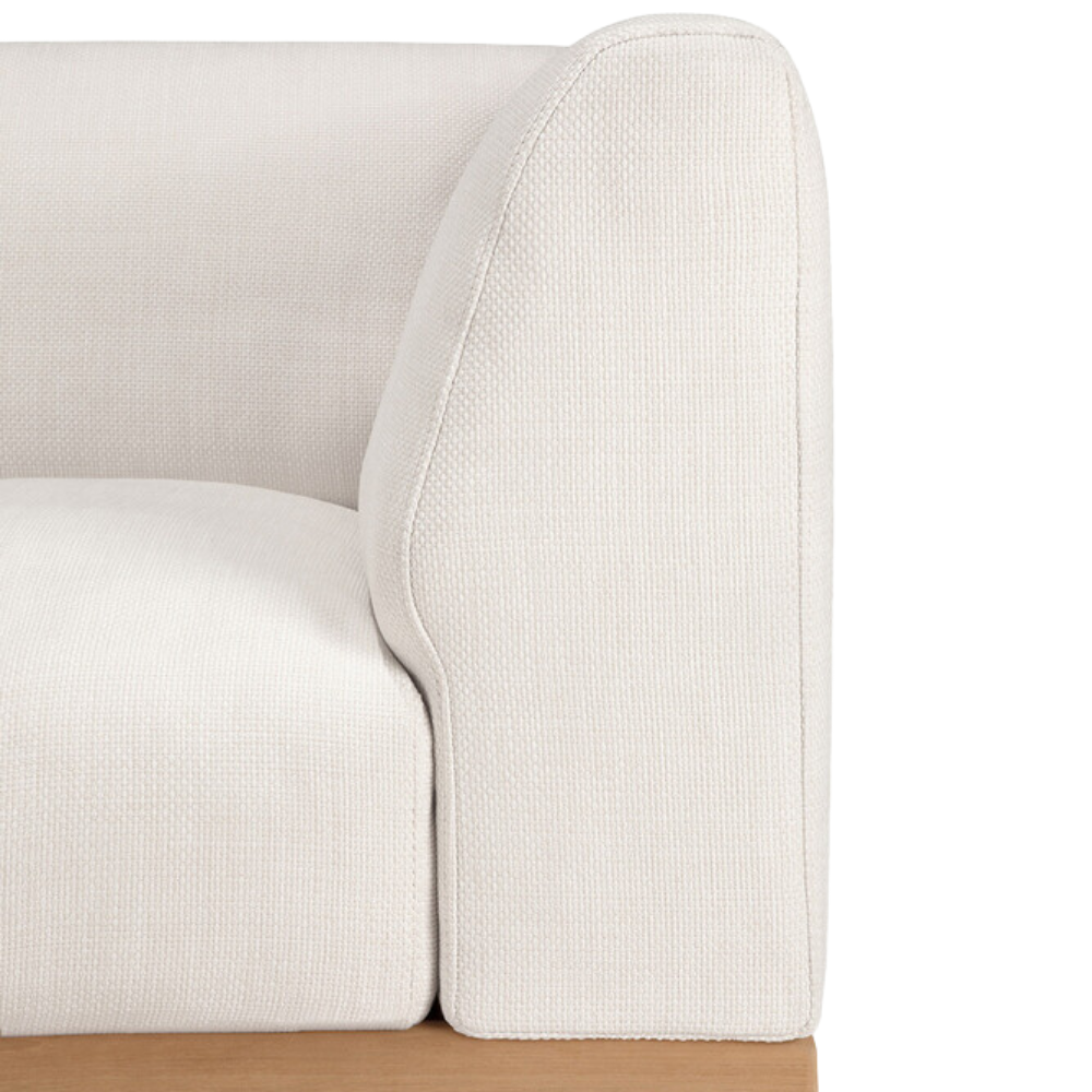 The Monocle Outdoor Modular Sofa Set I Left from Ethnicraft with a wooden base.