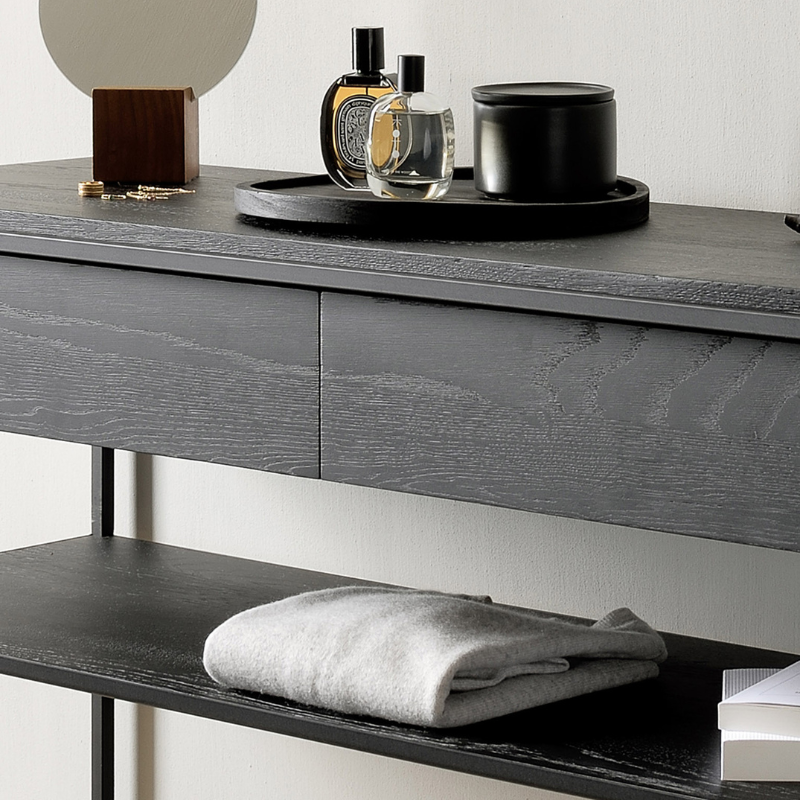 The Monolit Console from Ethnicraft in black oak in an entryway.