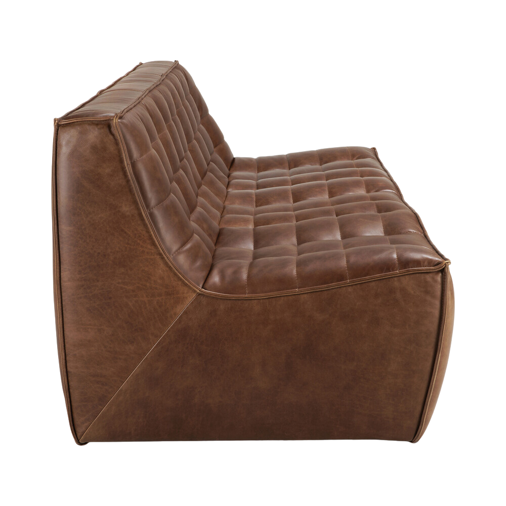 Ethnicraft's N701 3-seater Sofa in Chestnut leather profile view.