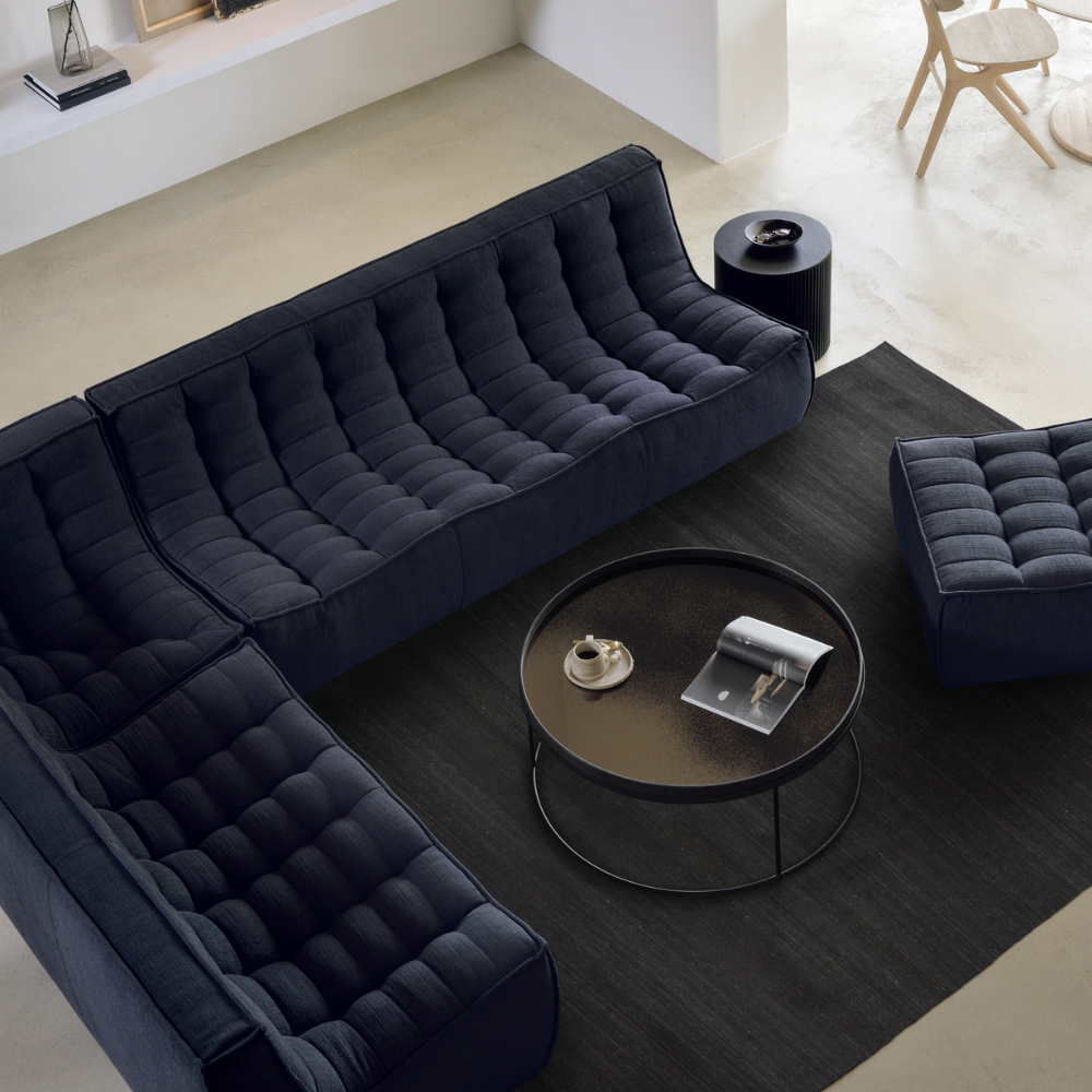 The N701 Modular Sofa from Ethnicraft with graphite eco fabric in a family area.