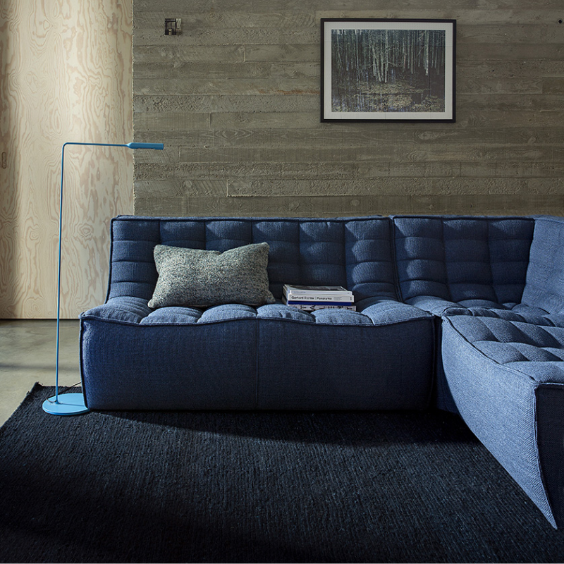 The N701 Corner Unit from Ethnicraft with blue standard fabric in a lounge.