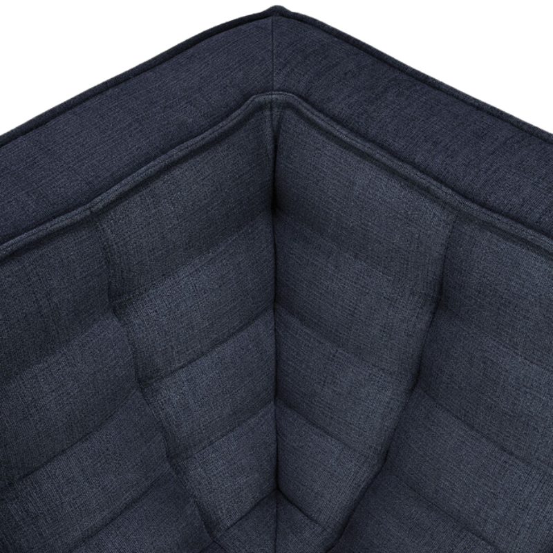 The N701 Corner Unit from Ethnicraft with graphite eco fabric focusing on the design.