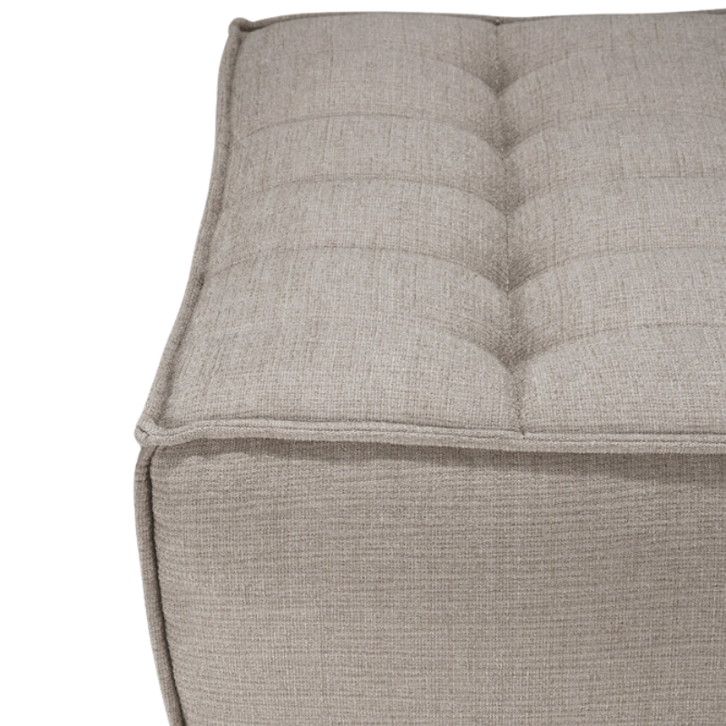 The N701 Footstool from Ethnicraft with ecru eco fabric in detail.