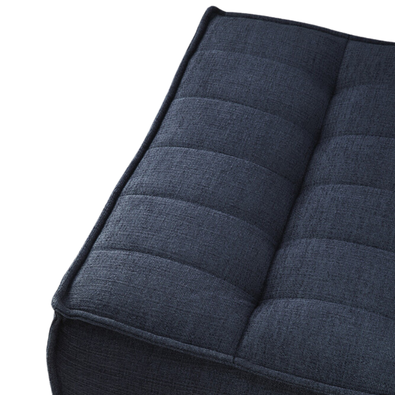 The N701 Footstool from Ethnicraft with graphite eco fabric close up.