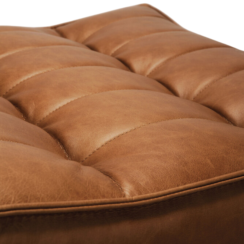 The N701 Leather Footstool from Ethnicraft close up.