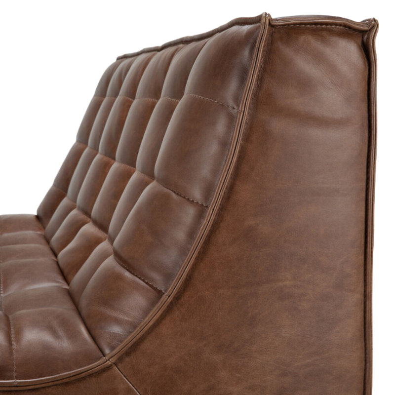 The N701 Leather Two Seater Sofa Chestnut by Ethnicraft with a close-up of the backrest from the side.