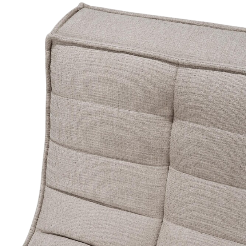 The N701 Lounge Chair from Ethnicraft with ecru eco fabric backrest.