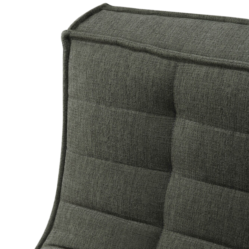 The N701 Lounge Chair from Ethnicraft with moss eco fabric close up.