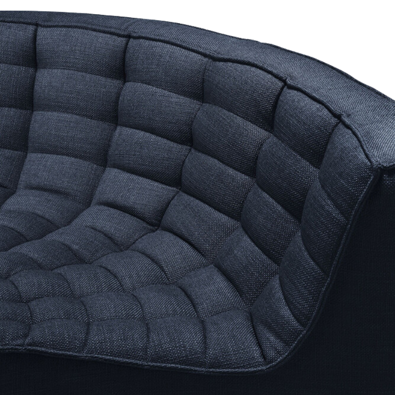 The N701 Modular Round Corner Sofa 1-2 from Ethnicraft in graphite eco fabric with a round curve in details. all-groups