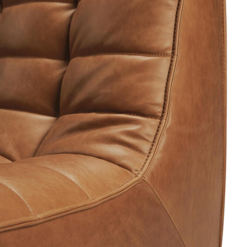 The N701 Modular Round Corner Sofa 1-2 Old Saddle from Ethnicraft armrest close-up. all-groups