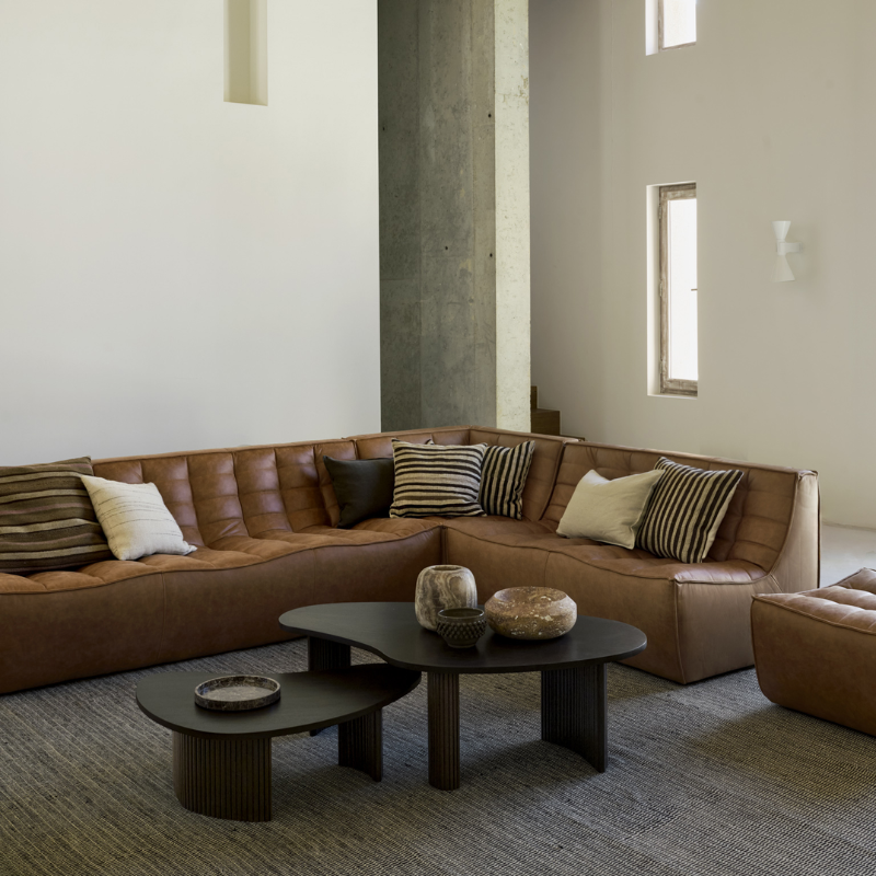 The N701 Modular Round Corner Sofa 2-3 Old Saddle from Ethnicraft in a living room. all-groups