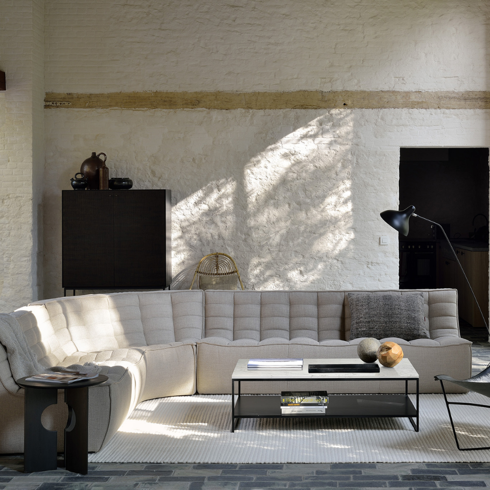 The N701 Modular Sofa from Ethnicraft with beige standard fabric in a living area.