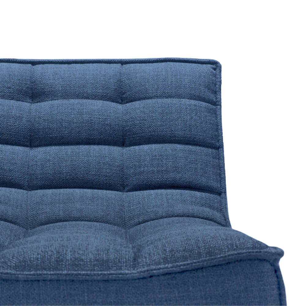 The N701 Modular Sofa from Ethnicraft with blue standard fabric highlighting the seat.