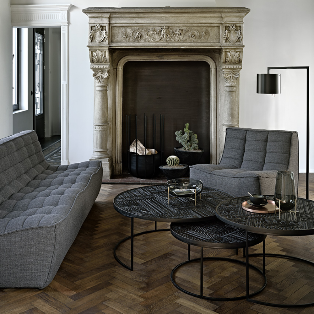 The N701 Modular Sofa from Ethnicraft with dark gray standard fabric in a living space.