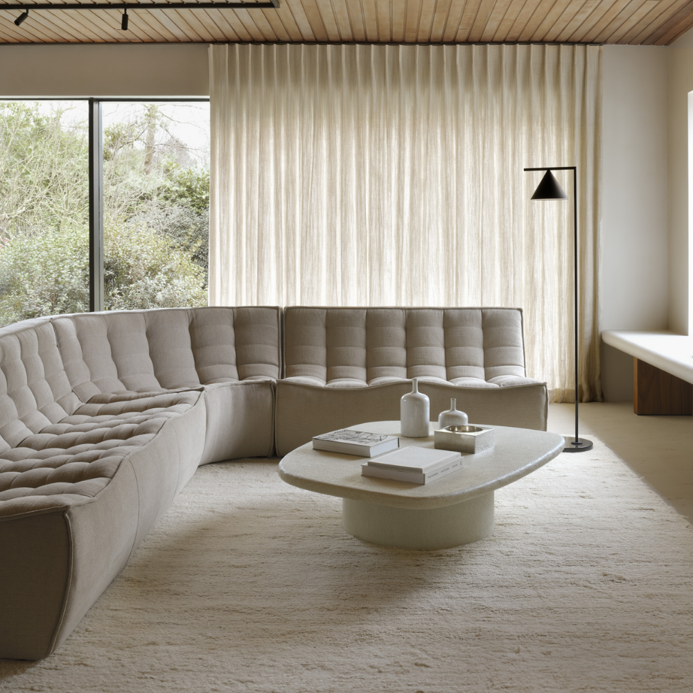 The N701 Modular Sofa from Ethnicraft with ecru eco fabric, a customizable sectional sofa option.