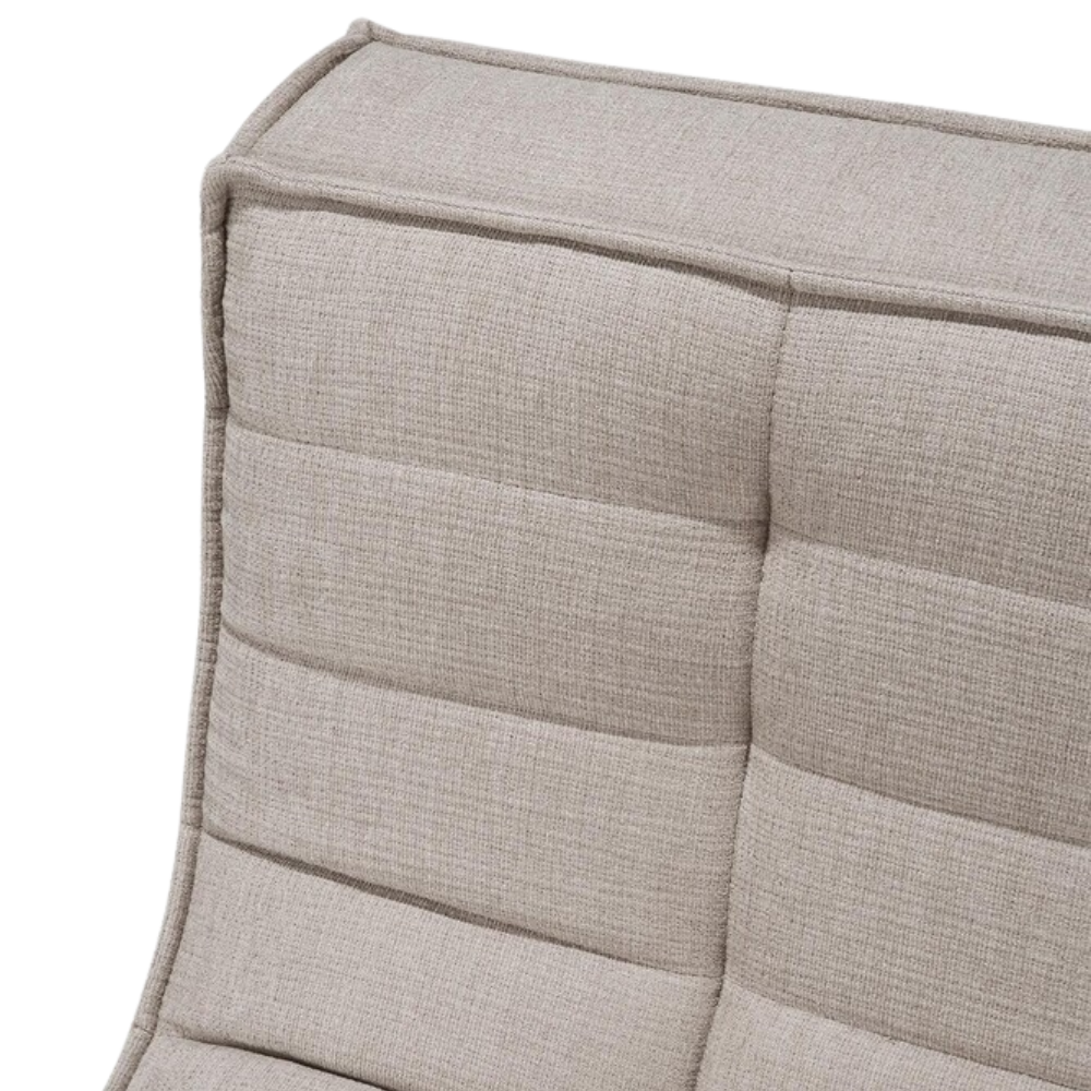 The N701 Modular Sofa from Ethnicraft with ecru eco fabric focusing on the stitching.