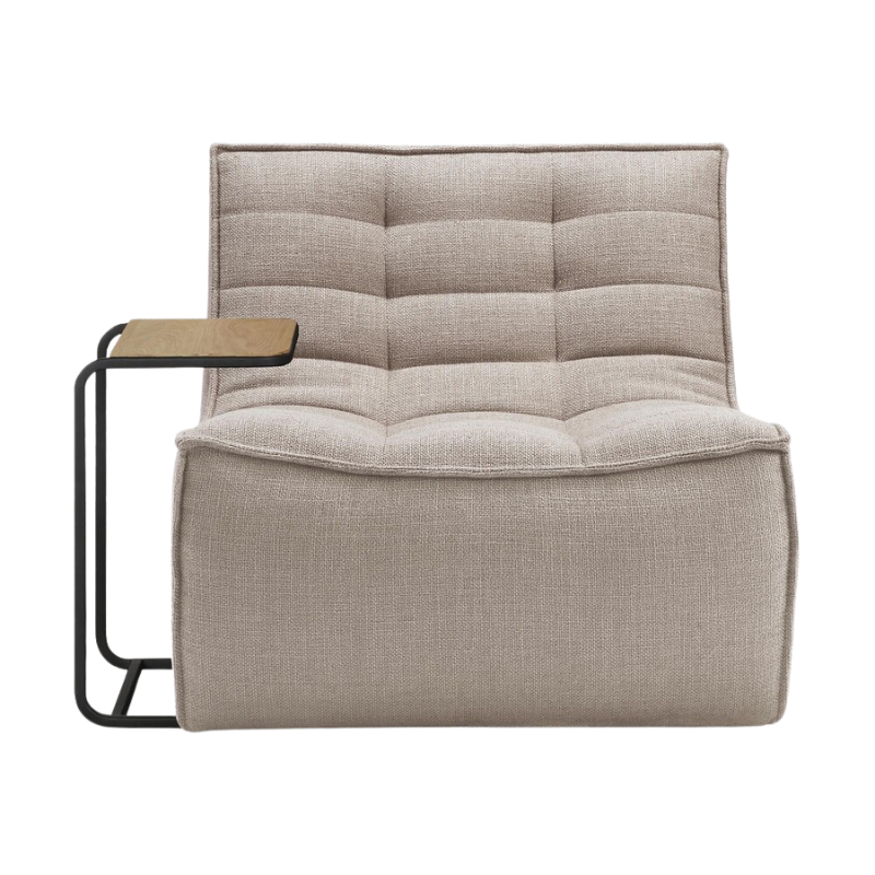 The N701 One Seater from Ethnicraft with beige standard fabric and a side table.