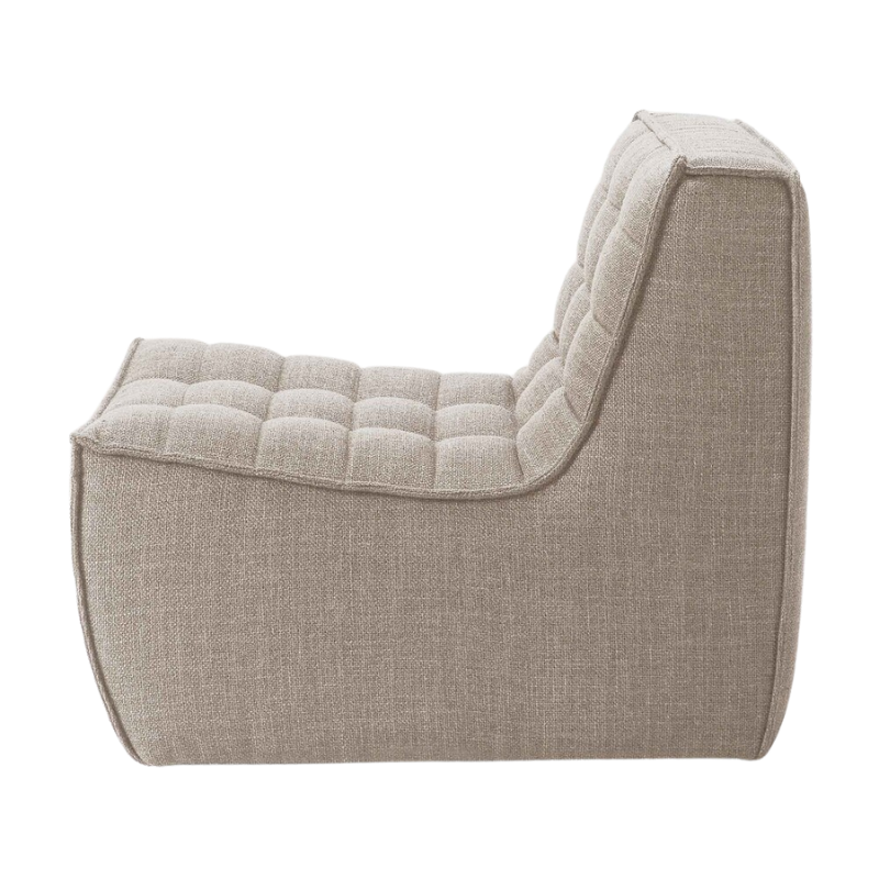 The N701 One Seater from Ethnicraft with beige standard fabric from the side.