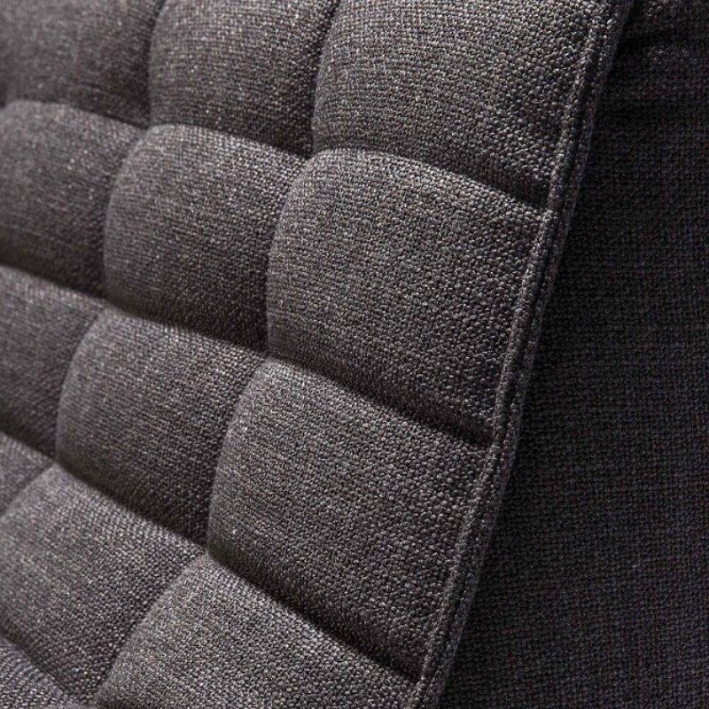 The N701 One Seater from Ethnicraft with dark grey standard fabric close up.