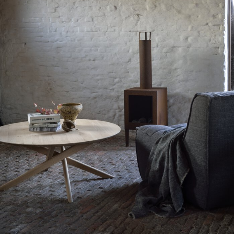 The N701 One Seater from Ethnicraft with dark grey standard fabric in a designer home.