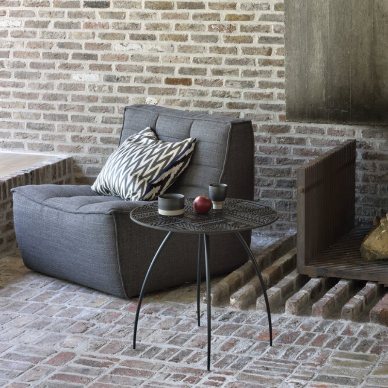 The N701 One Seater from Ethnicraft with dark grey standard fabric in a family area.