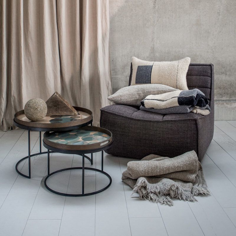 The N701 One Seater from Ethnicraft with dark grey standard fabric in a living area.