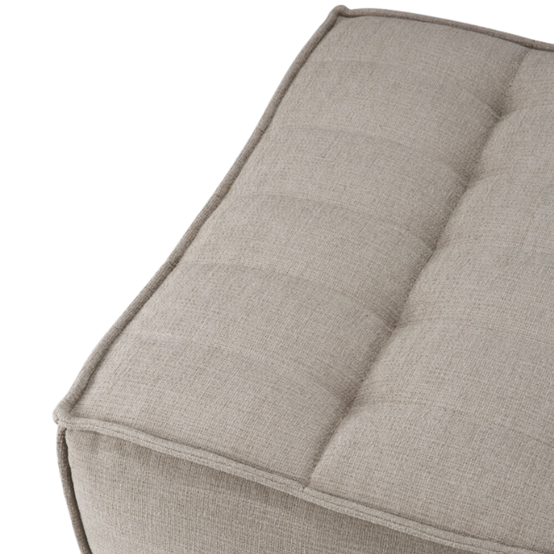 The N701 Ottoman from Ethnicraft with ecru eco fabric in a view from the top.