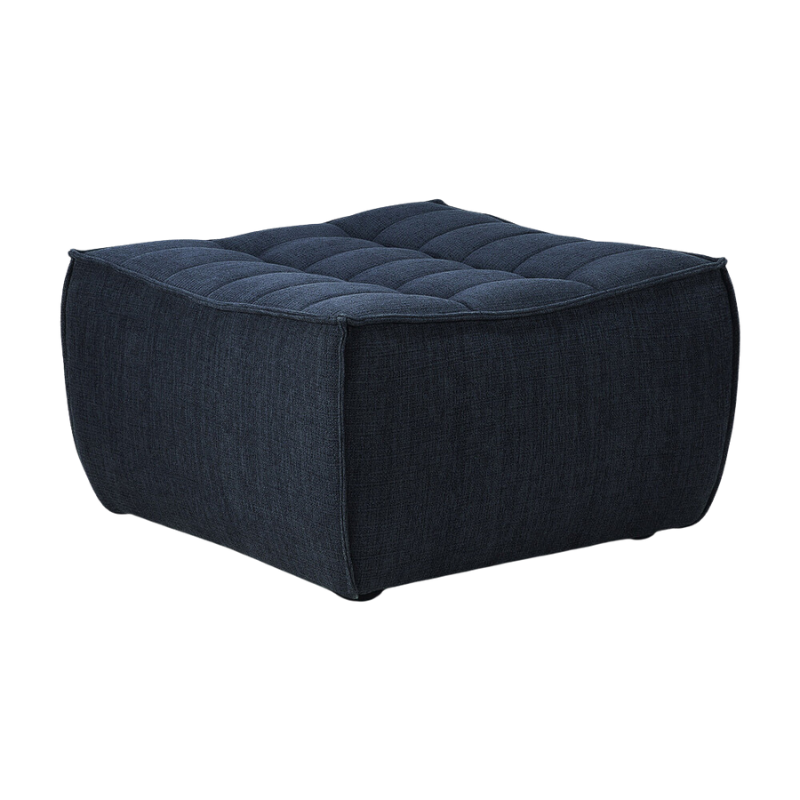 The N701 Ottoman from Ethnicraft with graphite eco fabric from an angle.