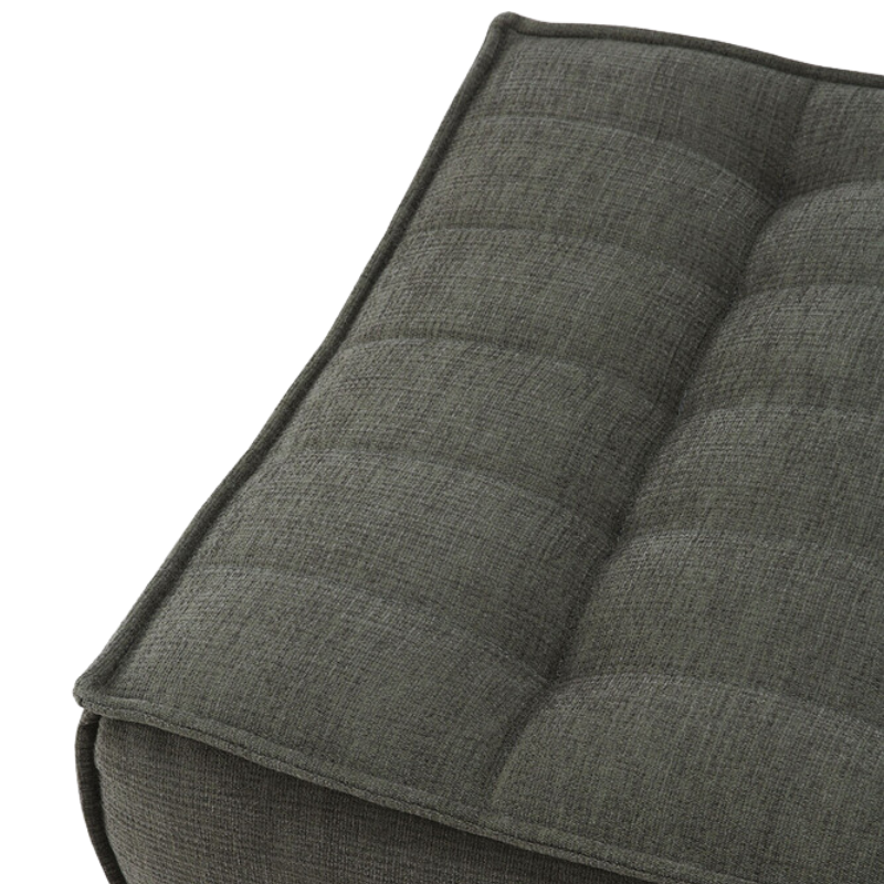 The N701 Ottoman from Ethnicraft with moss eco fabric close up.