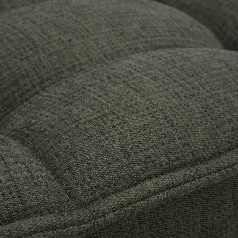 The N701 Ottoman from Ethnicraft with moss eco fabric highlighting the craftsmanship.