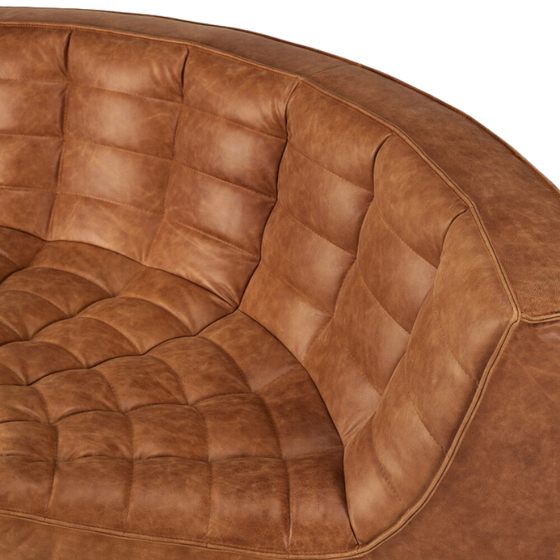 The N701 Round Leather Corner from Ethnicraft upholstered with 100% aniline leather.