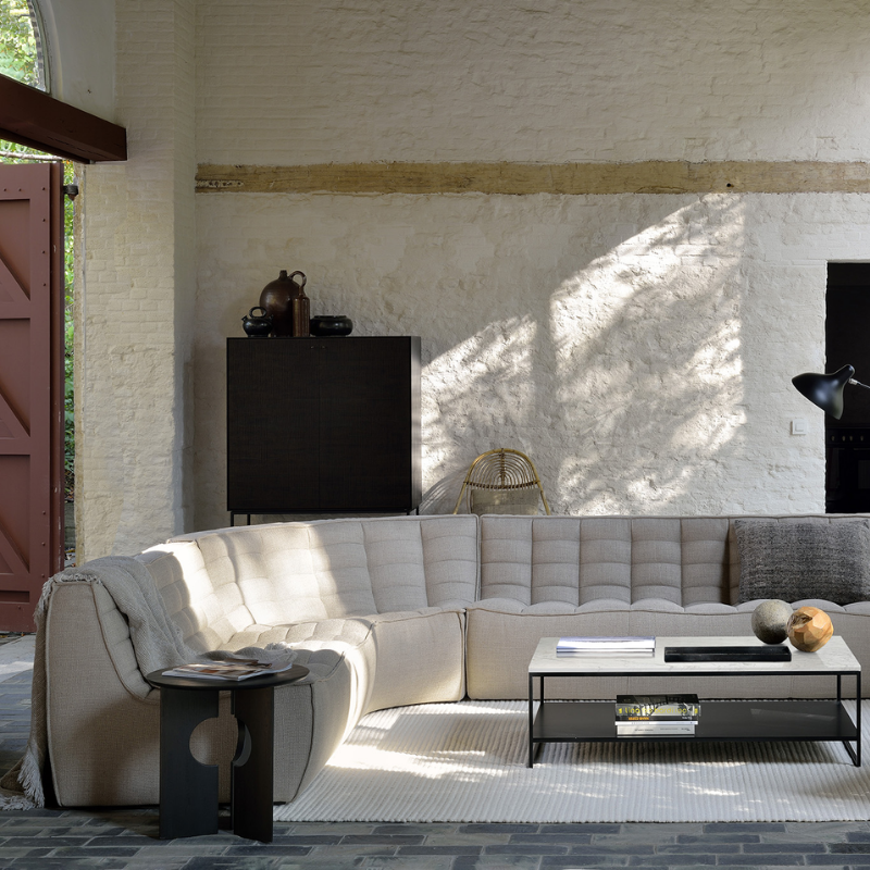 The N701 Two Seater Sofa from Ethnicraft with beige standard fabric in a living room.