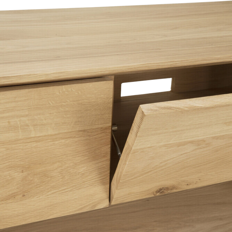 The Nordic TV Cupboard from Ethnicraft flip-down door.