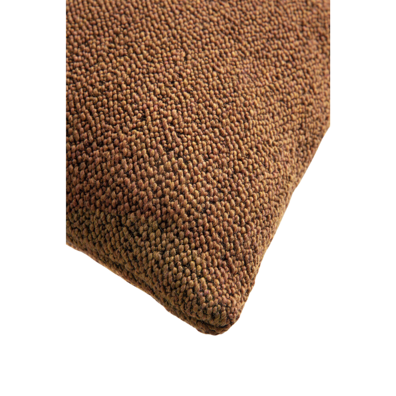 The fabric detail of the Nomad Rectangular Outdoor Cushion by Ethnicraft in marsala.