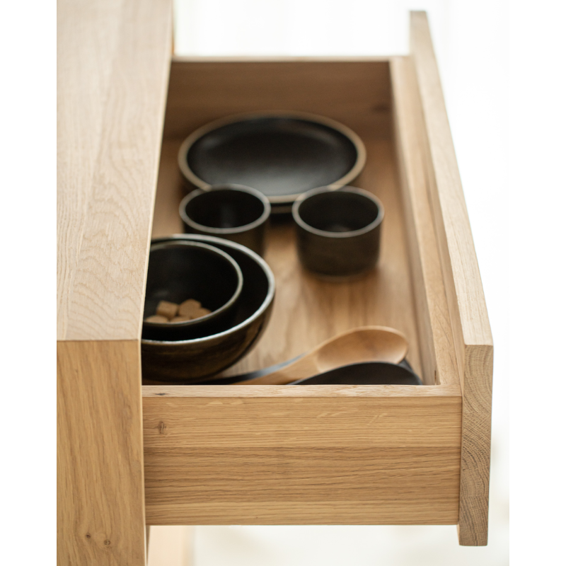 The Nordic II Hanging Bedside Table from Ethnicraft in a kitchen and dining space.