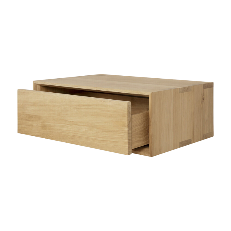 The Nordic II Hanging Bedside Table from Ethnicraft with an open drawer.
