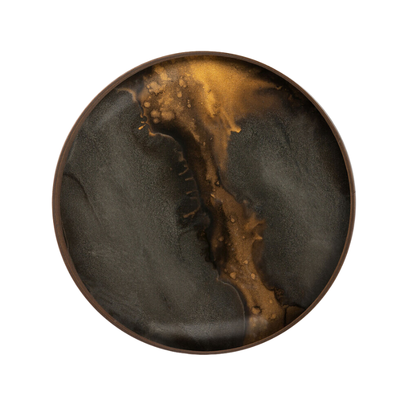 The round Organic Valet Tray from Ethnicraft in bronze.