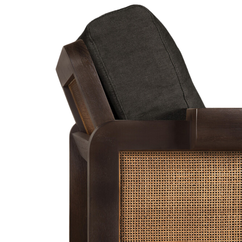 The Panel Lounge Chair by Ethnicraft with a backrest cushion, in a close-up.