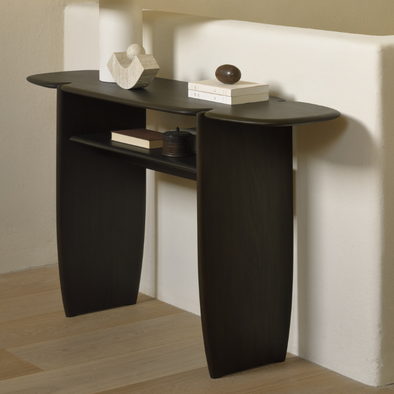 The PI Console from Ethnicraft in dark brown mahogany in a lounge.