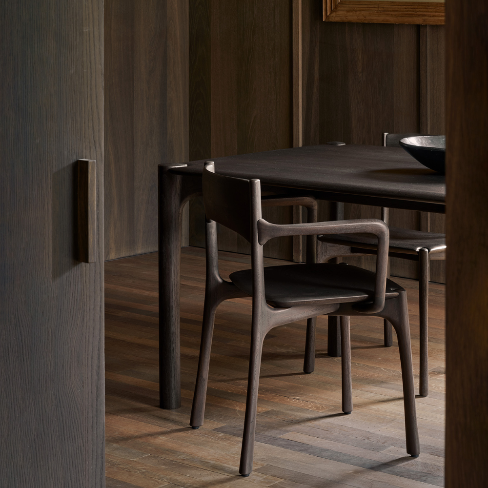 Ethnicraft's PI dining set in Teak Brown.