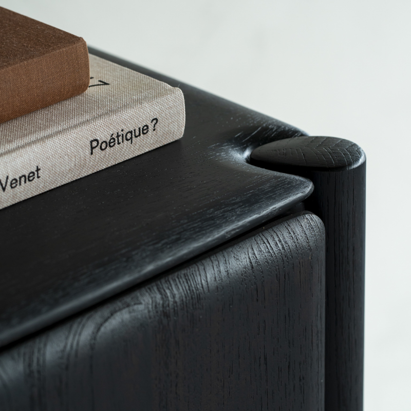 The PI Sideboard from Ethnicraft in dark brown teak close up.