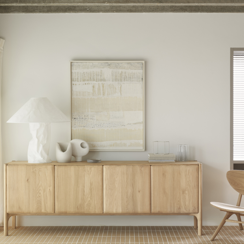 The PI Sideboard from Ethnicraft in oak in a living room.