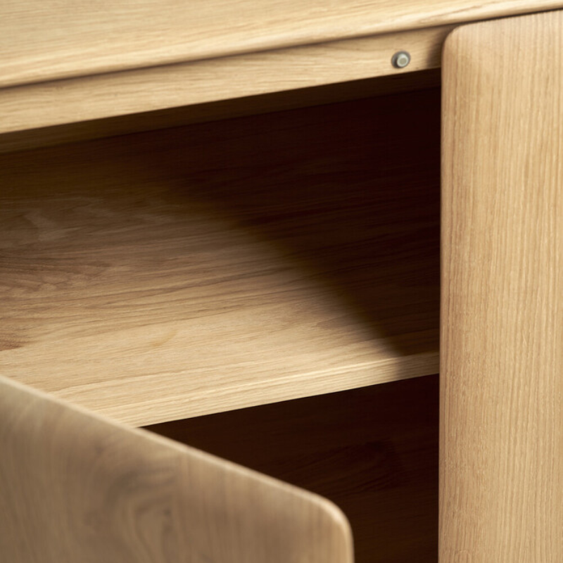 The PI Sideboard from Ethnicraft in oak showing the storage.