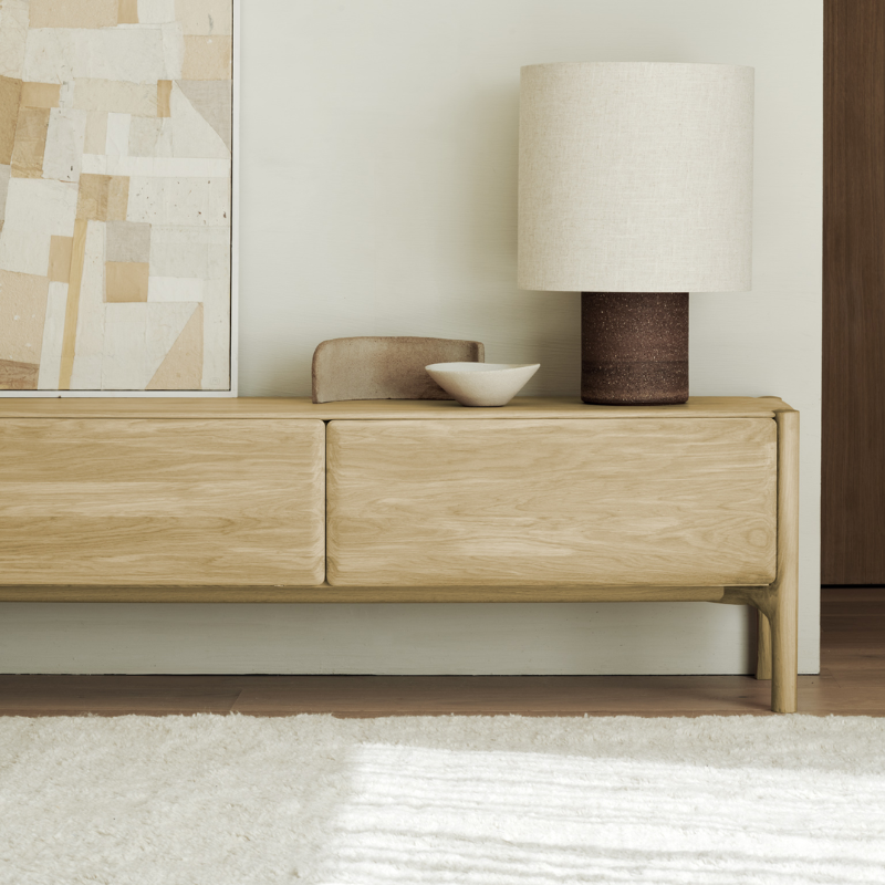 The PI TV Cupboard from Ethnicraft in a bedroom.